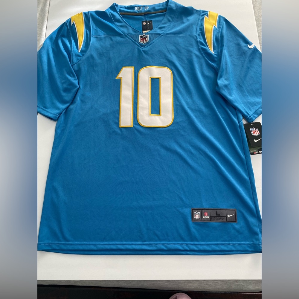 Herbert chargers jersey, new with tags, never worn, size Large, NIKE